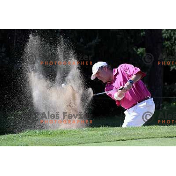 Gerry Jekl playing from the bunker at 9th hole at King\'s course at Bled during Vitranc Cup golf tournament on September 16, 2012 