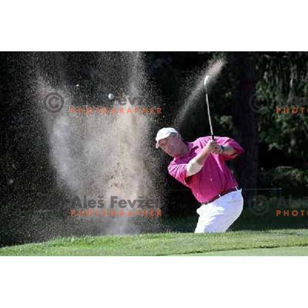 Gerry Jekl playing from the bunker at 9th hole at King\'s course at Bled during Vitranc Cup golf tournament on September 16, 2012 