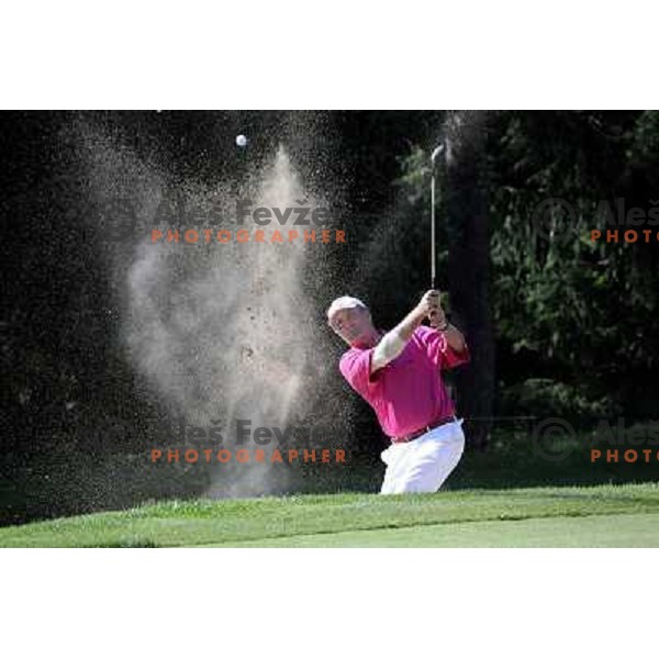 Gerry Jekl playing from the bunker at 9th hole at King\'s course at Bled during Vitranc Cup golf tournament on September 16, 2012 