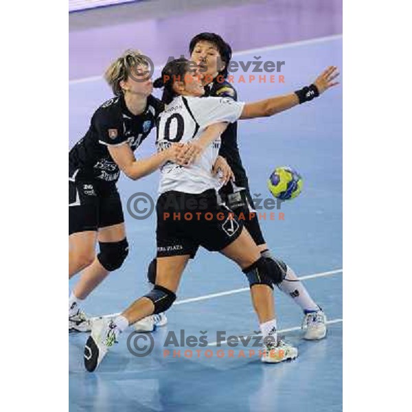 Maryna Vergeliuk, Ljudmila Bodnieva of Krim in action during handball match Krim Mercator - U Jolidon Cluj in EHF Champions league, played at Stozice Arena, Ljubljana, Slovenia on October 14, 2012 