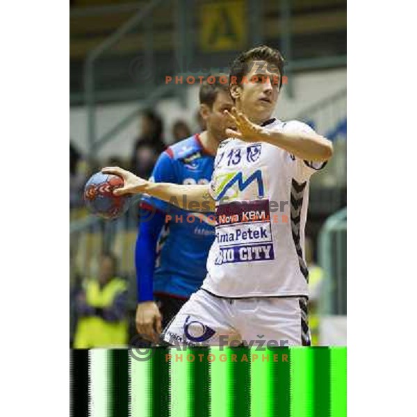 Simon Razgor in action during handball match Maribor Branik - HK Kopavogur, EHF league, played in Tabor Hall in Maribor, Slovenija on October 20, 2012 