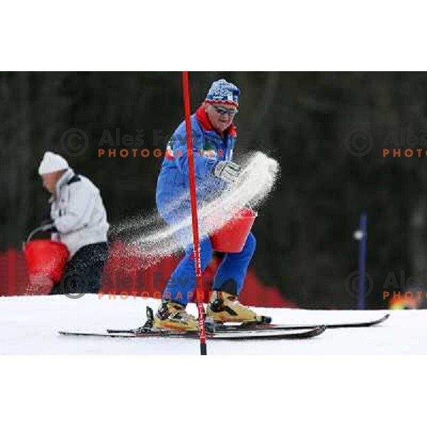 Preparation of the course with salt before first slalom run in Bardonecchia at 23rd Winter Universiade 2007 , Torino, Italy on 20.01.2007