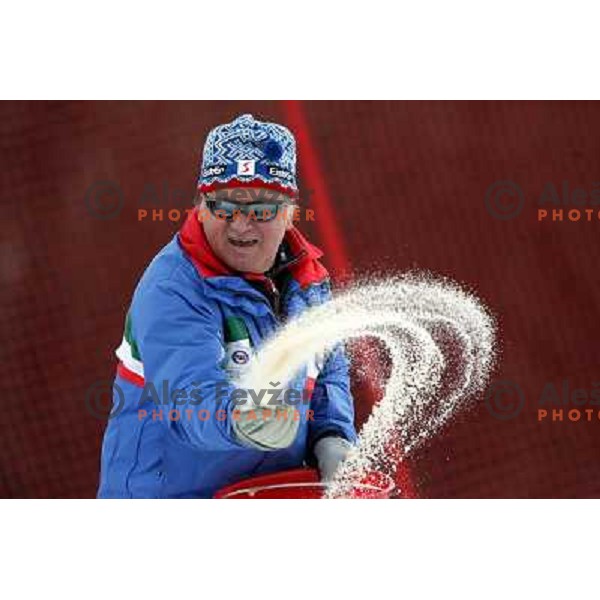 Preparation of the slope with salt do to high temperatures before first slalom run in Bardonecchia at 23rd Winter Universiade 2007 , Torino, Italy on 20.01.2007