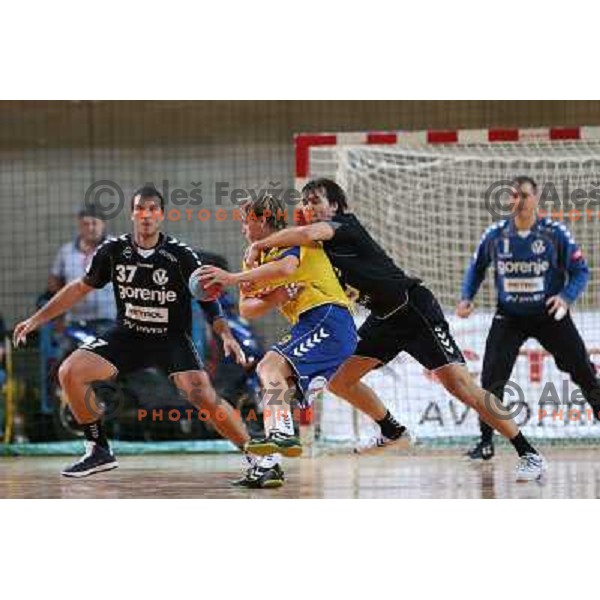 Dean Bombac of Cimos and Klemen Cehte of Gorenje Velenje in action during handball match Cimos Koper-Gorenje Velenje in round 8 of 1.NLB leasing liga 2012/13, played at Bonifika Hall, Koper on October 27,2012 