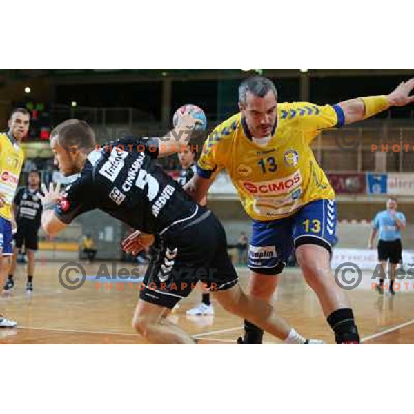 Niko medved of Gorenje Velenje and Krivokapic of Cimos in action during handball match Cimos Koper-Gorenje Velenje in round 8 of 1.NLB leasing liga 2012/13, played at Bonifika Hall, Koper on October 27,2012 