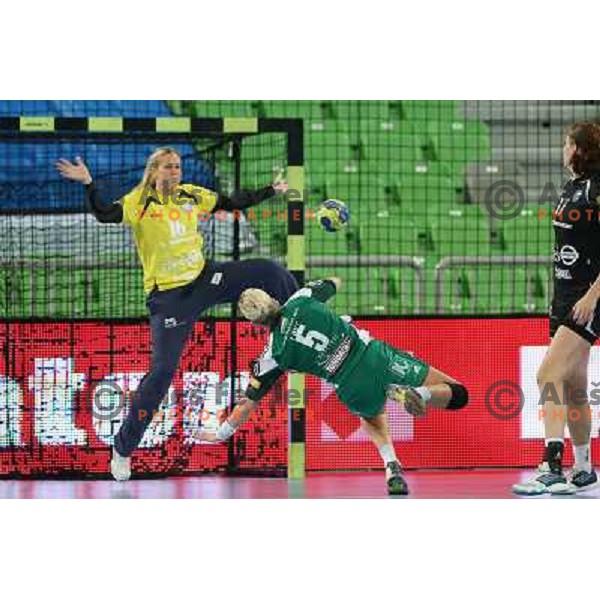 Heidi Loke and Gabriella Kain of Krim Mercator in action during handball match Krim Mercator-Gyori Audi Eto KC in round 3 of EHF Women\'s Champion league, played in Arena Stozice, Ljubljana, Slovenia on October 28, 2012 