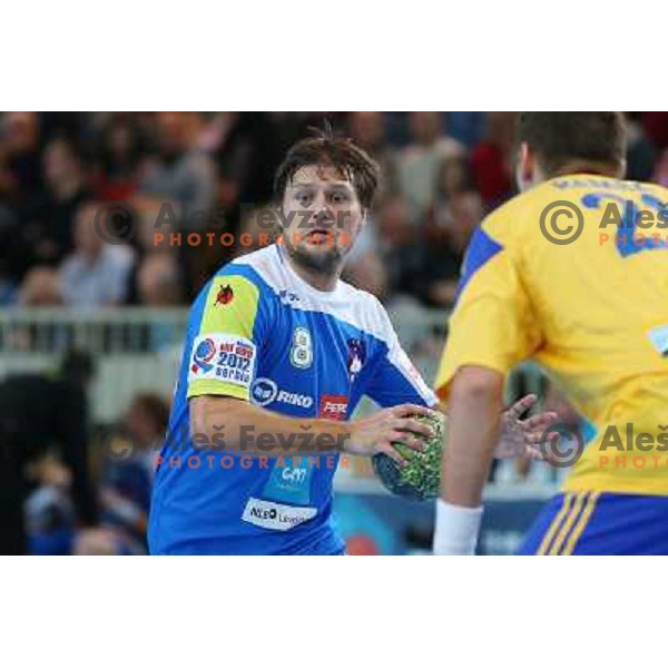 Marko Bezjak of Slovenia in action during handball match Slovenia-Romania in qualification for EHF Euro 2014, played in Bonifika Hall, Koper, Slovenia on October 31, 2012 