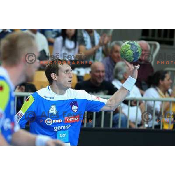 David Miklavcic of Slovenia in action during handball match Slovenia-Romania in qualification for EHF Euro 2014, played in Bonifika Hall, Koper, Slovenia on October 31, 2012 