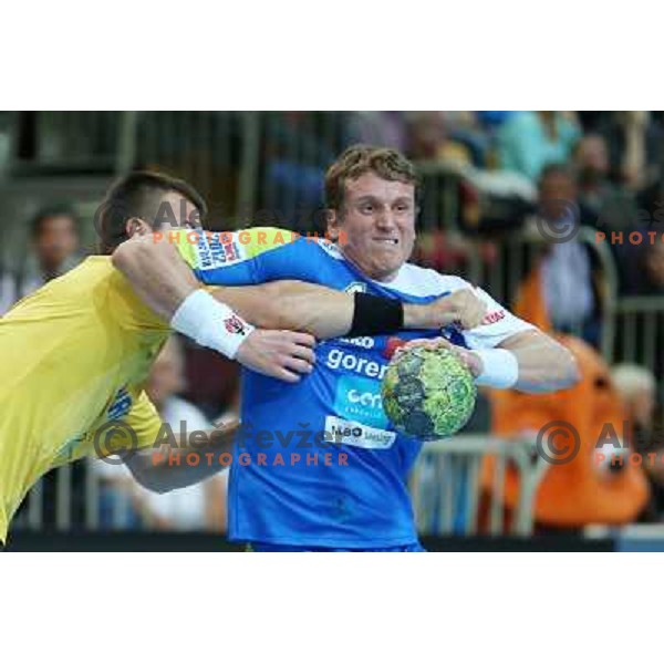 David Miklavcic of Slovenia in action during handball match Slovenia-Romania in qualification for EHF Euro 2014, played in Bonifika Hall, Koper, Slovenia on October 31, 2012 