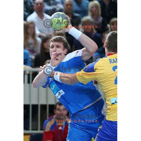 David Miklavcic of Slovenia in action during handball match Slovenia-Romania in qualification for EHF Euro 2014, played in Bonifika Hall, Koper, Slovenia on October 31, 2012 
