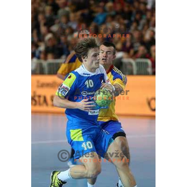 Jure Dolenec of Slovenia in action during handball match Slovenia-Romania in qualification for EHF Euro 2014, played in Bonifika Hall, Koper, Slovenia on October 31, 2012 