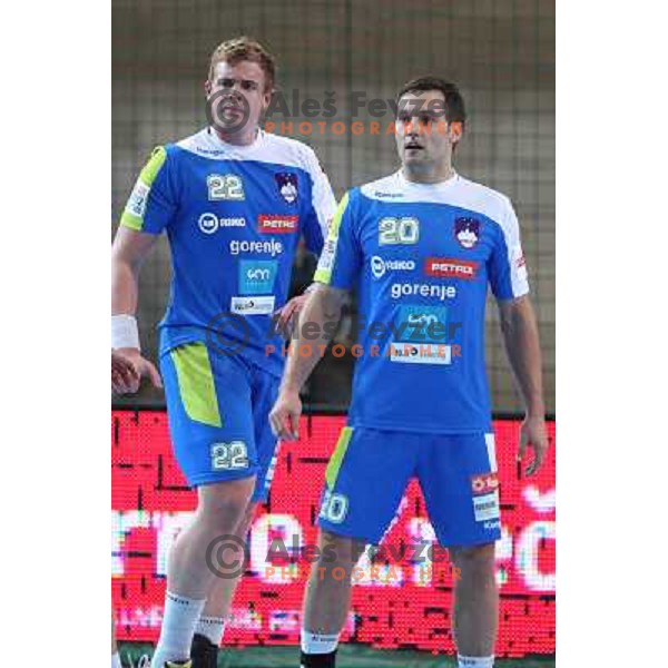 Matej Gaber and Luka Zvizej of Slovenia in action during handball match Slovenia-Romania in qualification for EHF Euro 2014, played in Bonifika Hall, Koper, Slovenia on October 31, 2012 