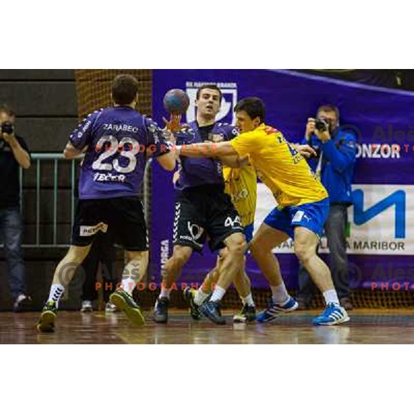 Miha Zarabec, Rok Simic, Nemaja Zelenovic (L-R) in action during handball match Maribor Branik - Celje pivovarno Laško, 1.NLB leasing league, played in Tabor Hall in Maribor, Slovenija on November 10, 2012 