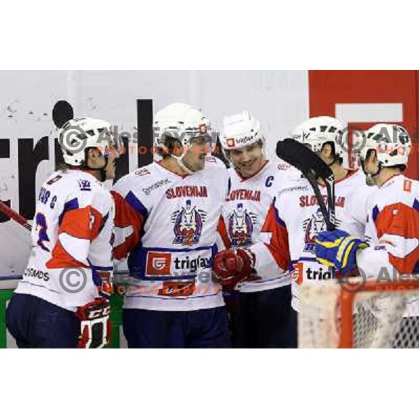 Gasper and Anze Kopitar,Marcel Rodman of Slovenia in action during ice-hockey match Slovenia-Austria at EIHC tournament in Hala Tivoli, Ljubljana, Slovenia on November 10,2012 