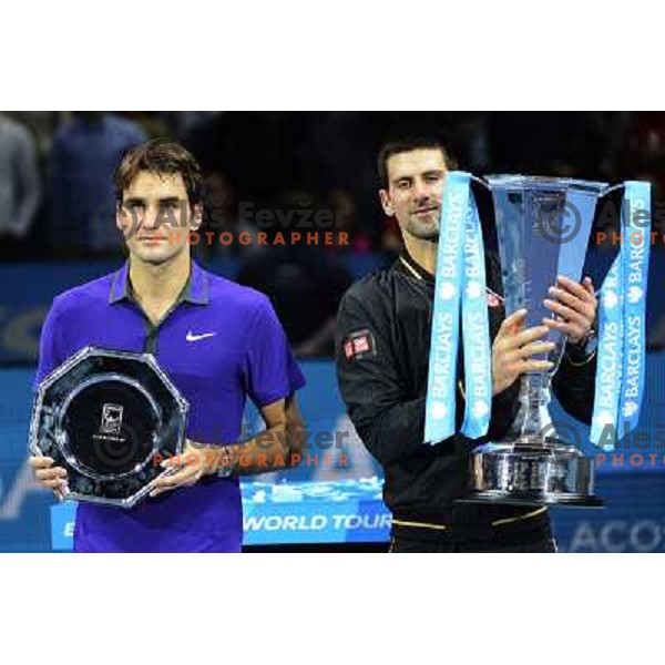 Roger Federer of Switzerland and Novak Djokovic of Serbia, winner of ATP World Tour Finals tournament in O2 Arena, London, Great Britain on November 12, 2012 