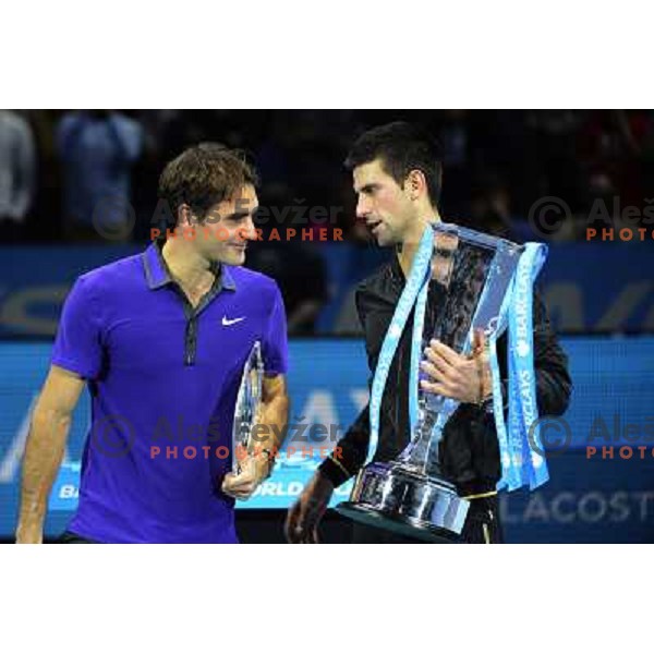 Roger Federer of Switzerland and Novak Djokovic of Serbia, winner of ATP World Tour Finals tournament in O2 Arena, London, Great Britain on November 12, 2012 