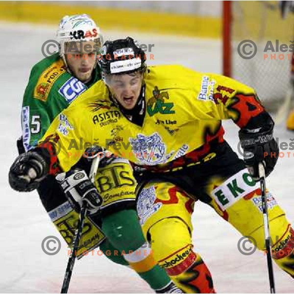 Jaka Avgustincic (21) drives past Domen Vedlin (5) during semi-final of Interliga match ZM Olimpija- BR Slavija in Hala Tivoli, Ljubljana, Slovenia 23.1.2007