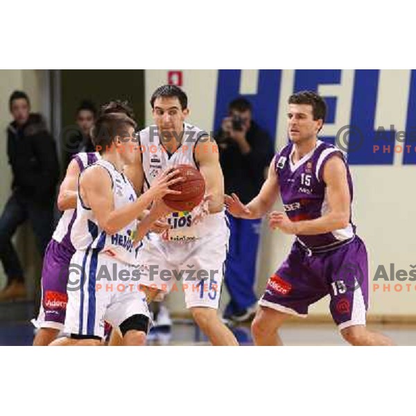 Matic Rebec,Nikola Gacesa of Helios Domzale in action during basketball match Helios Domzale-Maribor Messer in round 7 of Telemach league, played in Domzale Sports Hall, Slovenia on December1, 2012 