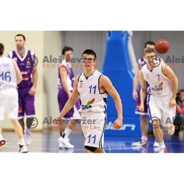 Matic Rebec of Helios Domzale in action during basketball match Helios Domzale-Maribor Messer in round 7 of Telemach league, played in Domzale Sports Hall, Slovenia on December1, 2012 