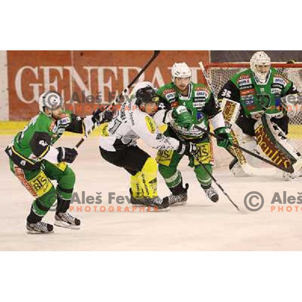 Andrej Hebar, Igor Cvetek, Jerry Kuhn of Telemach Olimpija in action during ice hockey match Telemach Olimpija Ljubljana- Dornbirn in round 31 of Ebel league 2012/13 played in Hala Tivoli, Ljubljana, Slovenia on December 16, 2012 