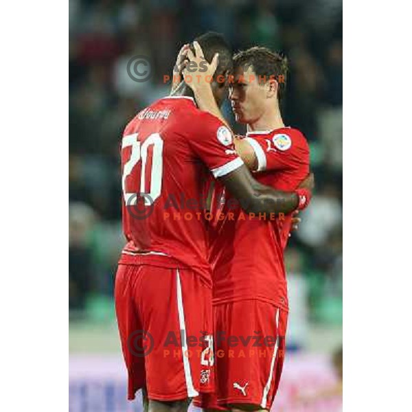Djourou and Lichtsteiner of Switzerland during football match Slovenia-Switzerland in group E in FIFA 2014 World Cup Brasil Qualifiers, played in Arena Stozice, Ljubljana, Slovenia on September 7, 2012 
