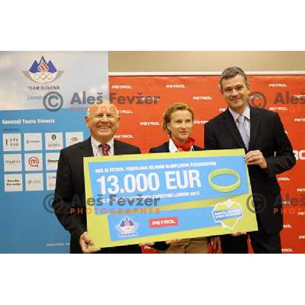 Janez Kocijancic, Brigita Langerholc Zeger, Tomaz Berlocnik, CEO of Petrol during press conference of Petrol donation to young slovenian sportsmen under Olympic Comittee patronage in Ljubljana, Slovenia on October 23, 2012 