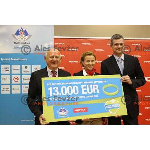 Janez Kocijancic, Brigita Langerholc Zeger, Tomaz Berlocnik, CEO of Petrol during press conference of Petrol donation to young slovenian sportsmen under Olympic Comittee patronage in Ljubljana, Slovenia on October 23, 2012 