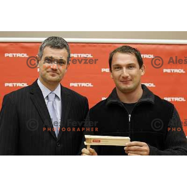 Tomaz Berlocnik, CEO of Petrol and Primoz Kozmus during press conference of Petrol donation to young slovenian sportsmen under Olympic Comittee patronage in Ljubljana, Slovenia on October 23, 2012 