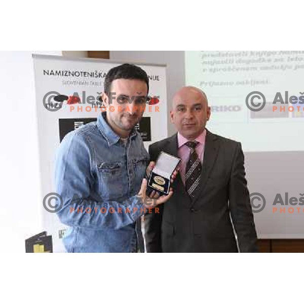 Marjan Hribar, president of NTZS and Bojan Tokic, best slovenian table tennis player during presentation of awards for best players in Slovenia in 2012 in Plaza Hotel, Ljubljana on January 23, 2013 