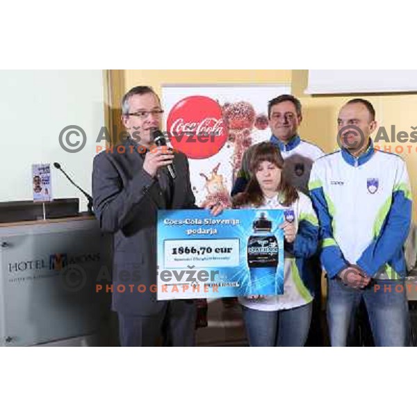 Uros Kanduc, Ceo of Coca Cola Slovenija, Ljubomir Milicevic, Larisa Bitici and Andrej Rauh at Press conference of Slovenia Special Olympics team in hotel Mons, Ljubljana on January 24, 2013 before departure to World Winter Games in PyeongChang 2013 in Sou