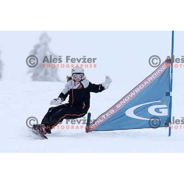 Sara Goltes 12-years old snowboard racer during Goltes Carving festival at Rogla Ski resort, Slovenia on February 15, 2013 
