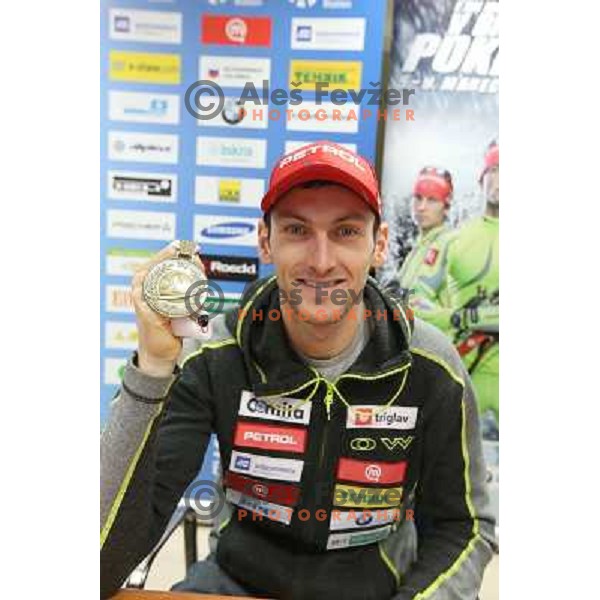 Jakov Fak of Slovenia showing bronze medal from World Biathlon Championships 2013 at press conference in Ljubljana on February 18, 2013 