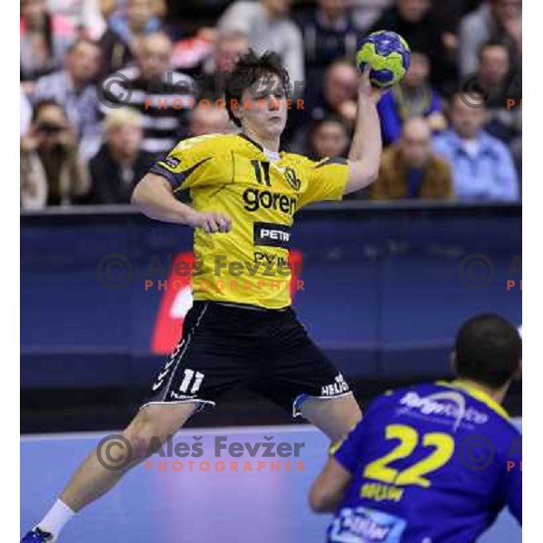 Jure Dolenec of RK Gorenje Velenje in action during handball match RK Gorenje Velenje-KS Vive Targi Kielce in EHF Velux Champions league, played in Red Hall, Velenje, Slovenia on February 23, 2013 