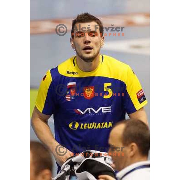 Michal Jurecki of KS Vive Targi Kielce in action during handball match RK Gorenje Velenje-SK Vive Targi Kielce in EHF Velux Champions league, played in Red Hall, Velenje, Slovenia on February 23, 2013 