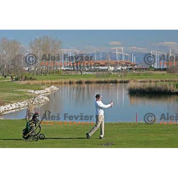 playing 2nd hole at Grado golf course, Italy