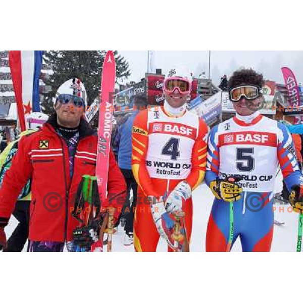 Duplicates of Hermann Maier, Pirmin Zurbriggen and Alberto Tomba at Retro Ski Fest - vintage skiing day at Krvavec Ski resort, Cerklje, Slovenia on March 2, 2013 