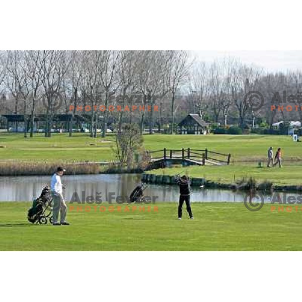 playing 2nd hole at Grado golf course, Italy