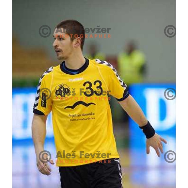 Blaz Sendelbah of RK SVIS in action during handball match RK SVIS Pekarna Grosuplje-RK Gorenje Velenje in semi-final of Slovenian Handball Cup played in Tri Lilije Hall, Lasko, Slovenia on March 2, 2013 