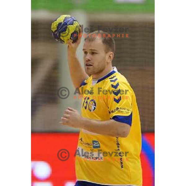 Nejc Poklar of Cimos Koper in action during handball match Cimos Koper-Celje Pivovarna Lasko in semi-final of Slovenian Handball Cup played in Tri Lilije Hall, Lasko, Slovenia on March 2, 2013 
