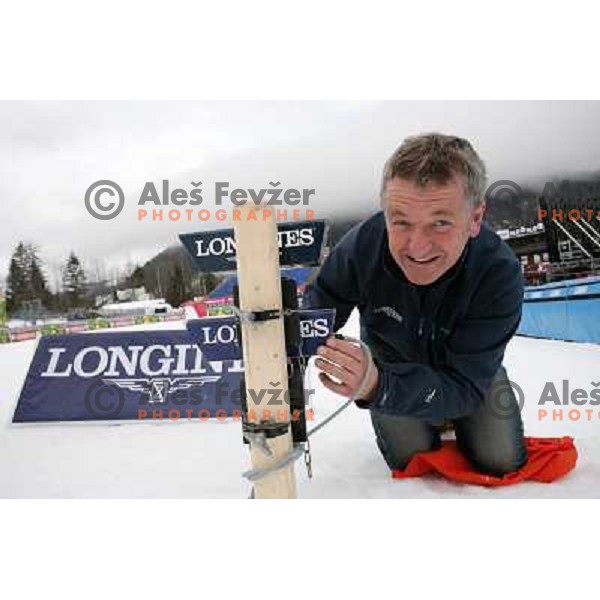 Volunteers of Vitranc World Cup races during final day of preparation of the slope in Kranjska Gora, Slovenia on March 8 ,2013 