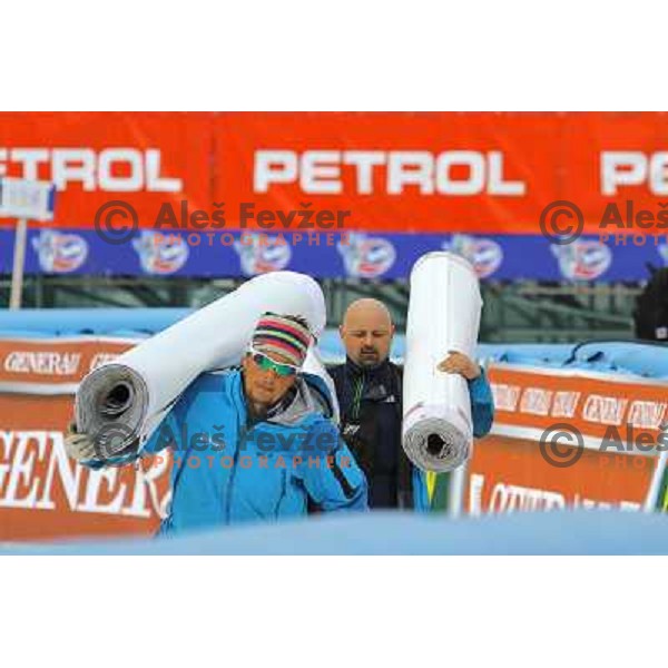 Volunteers of Vitranc World Cup races during final day of preparation of the slope in Kranjska Gora, Slovenia on March 8 ,2013 