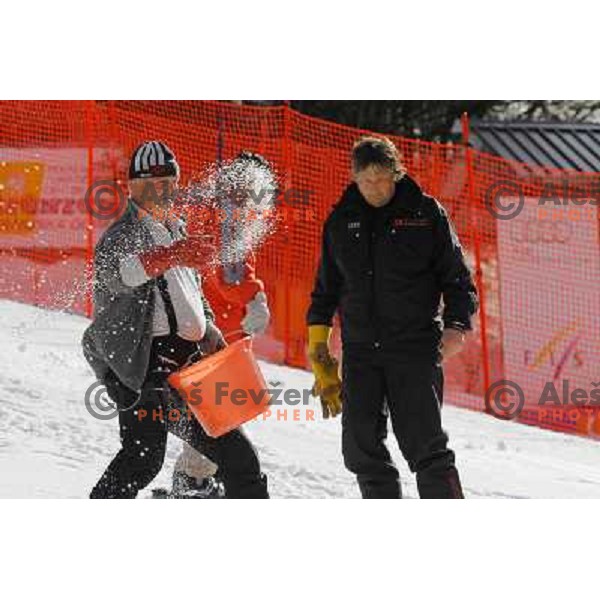 Volunteers of Vitranc World Cup races during final day of preparation of the slope in Kranjska Gora, Slovenia on March 8 ,2013 