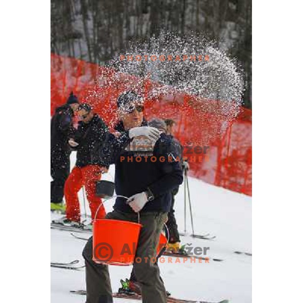 Janez Smitek and Volunteers of Vitranc World Cup races during final day of preparation of the slope in Kranjska Gora, Slovenia on March 8 ,2013 