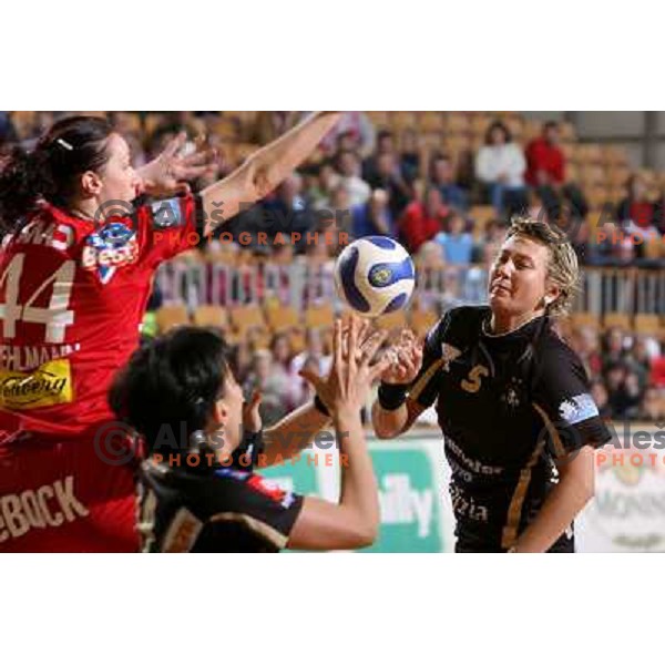 Derepasko passes to Bodnieva at EHF Championsleague match Krim Mercator- Aalborg DH in Hala Tivoli, Ljubljana. Krim Mercator won the match 30:26.