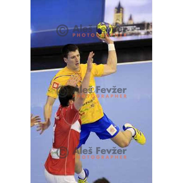 Nemanja Zelenovic in action during eight-final of EHF Velux Men\'s Champions league handball match RK Celje Pivovarna Lasko- HSV Hamburg, played in Zlatorog Arena, Celje, Slovenia on March 17, 2013 