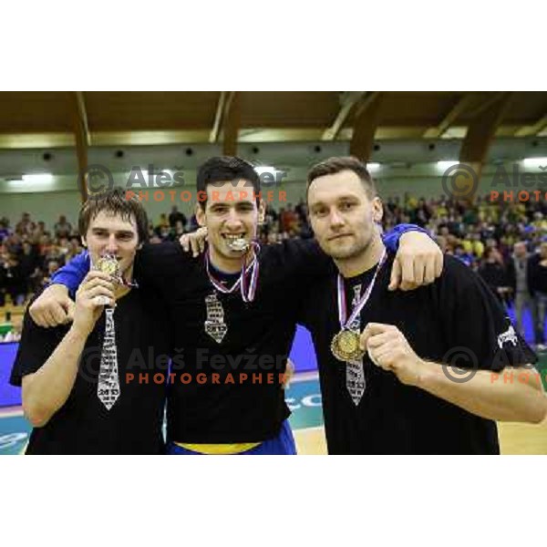 Sebastian Skube, Igor Zabic, Luka Zvizej celebrate victory at handball match Gorenje Velenje-Celje Pivovarna Lasko in the Final of Slovenian Handball Cup played in Tri Lilije Hall, Lasko, Slovenia on March 3, 2013 