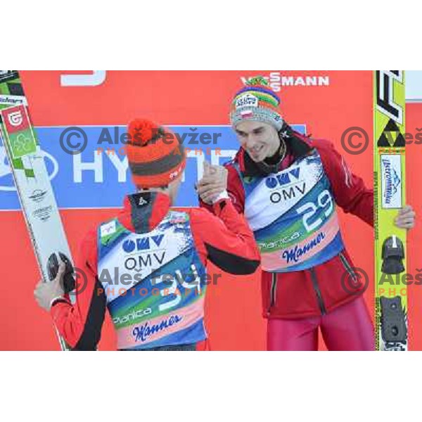 Peter prevc of Slovenia and Piotr Zyla of Poland during of FIS Ski Jumping World Cup Planica, March 22th, 2013 in Planica, Slovenia 
