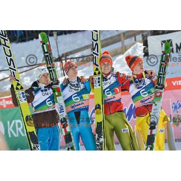 Robert Kranjec, Andraz Pograjc, Peter Prevc and Jurihj Tepes of Slovenia during team competition at FIS Ski jumping World Cup Final in Planica, Slovenia on March 23, 2013 