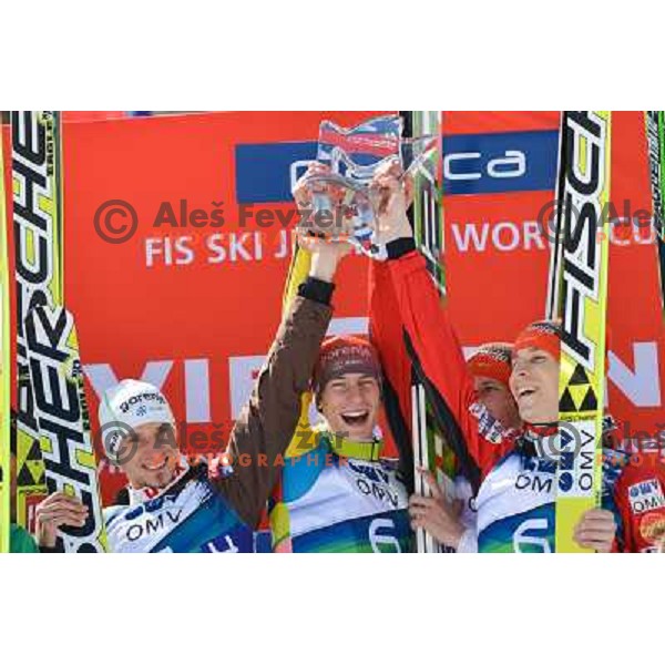 Robert Kranjec, Andraz Pograjc, Peter Prevc and Jurihj Tepes of Slovenia during team competition at FIS Ski jumping World Cup Final in Planica, Slovenia on March 23, 2013 