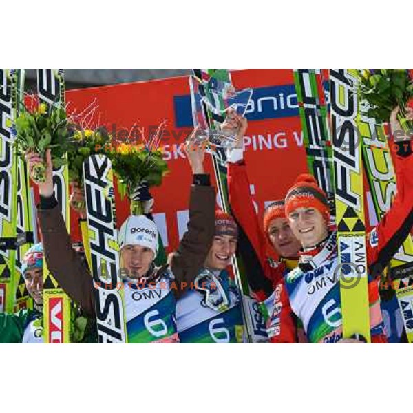 Robert Kranjec, Andraz Pograjc, Peter Prevc and Jurij Tepes of Slovenia during team competition at FIS Ski jumping World Cup Final in Planica, Slovenia on March 23, 2013 